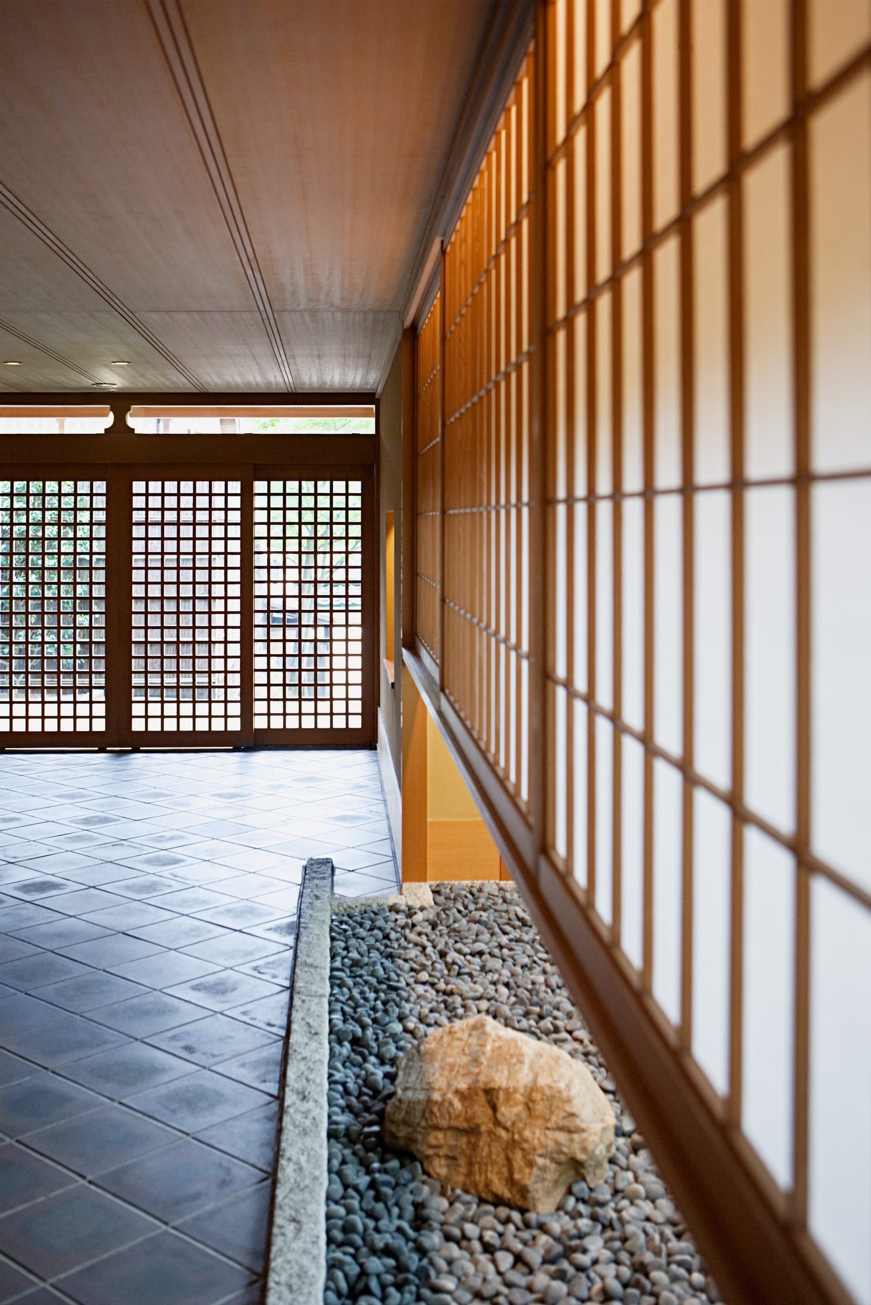 A sunlit ryokan corridor in spring