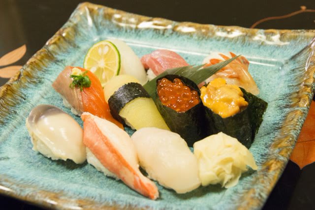 A platter of nigiri sushi at a Hokkaido counter